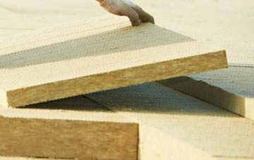 measuring Burntwood Green tapered insulation